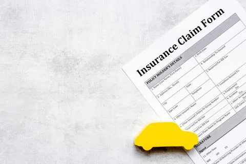 Insurance claim form with car shape. Top view Stock Photos