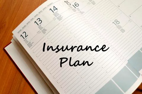 Insurance plan write on notebook Stock Photos