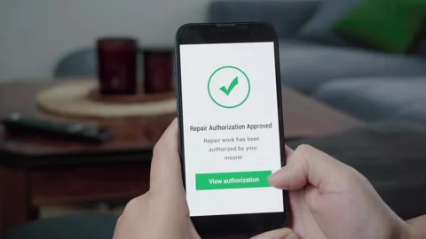 Insurance Repair Authorization Approved Notification on Home App Stock Footage 342669780