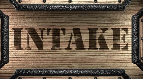 Intake on wooden stamp Stockbeeldmateriaal 8653322