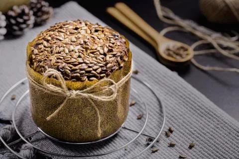Integral Bread with Sunflower on Black Table Stock Photos