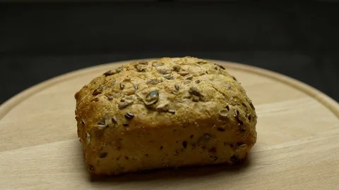 Integral bread on a wooden board Stock Footage 106753467