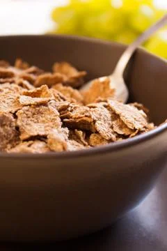 Integral cereal flakes for breakfast Stock Photos