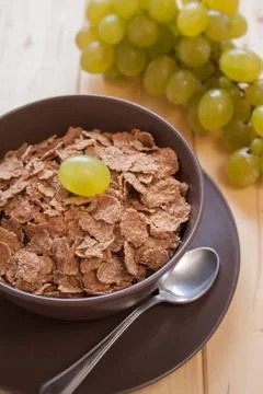 Integral cereal flakes for breakfast Stock Photos