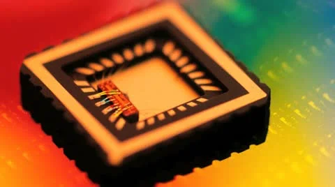 Integrated circuit with covers off showing internal chip. silicon wafer backd Stock Footage 20545008