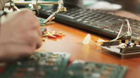 Integrated Circuit. Hand of a Young Man Stock Footage 79079068