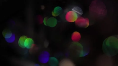 Integration of colorful sparkling bokeh of different sizes in the background Stock Footage 317449674