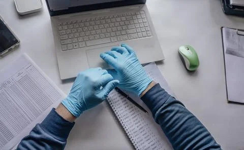 Integration of technology in laboratory research. hands and laptop, modern Stock Photos