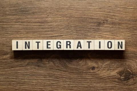 Integration - word concept on building blocks, text Stock Photos