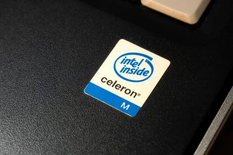 Intel Celeron Inside old obsolete laptop computer manufacturer sticker, old.. Stock Photos