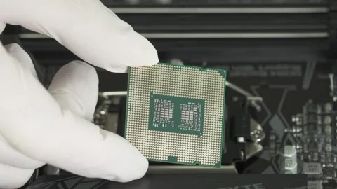 Intel Central processor i9 CPU to socket 1200 on Motherboard background. Unit Na Stock Footage 148899540