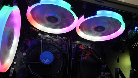 Intel processor logo and cooling fans illuminated by LEDs Stock Footage 113903149
