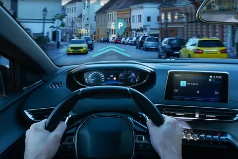 Inteligent car navigation to parking place concept Foto stock