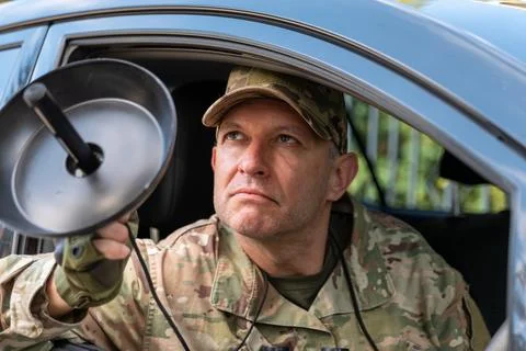 Intelligence operative secretly intercepts a distant conversation using a d.. Stock Photos