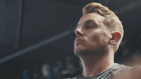 Intense athlete cooling down Stock Footage 76723275