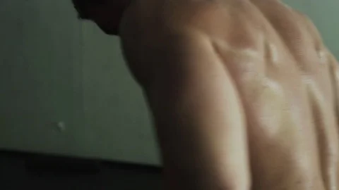 Intense athlete doing kettlebell squats Stock Footage 70107554