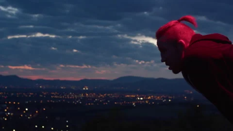 Intense athlete training at dusk with stunning city view in background Stock Footage 319917599
