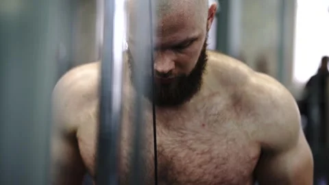 Intense back workout with the pullover exercise Stock Footage 241160554