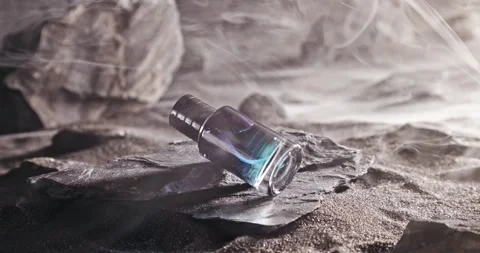 Intense blue perfume in environment rocks and volcanic sand. 스톡 동영상 332621990