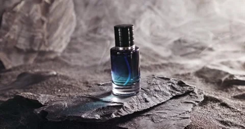Intense blue perfume in environment rocks and volcanic sand. Stock-Footage 335107877
