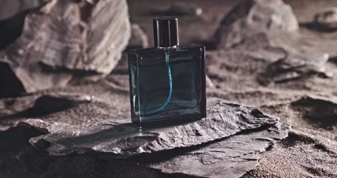 Intense blue perfume in environment rocks and volcanic sand. Stock-Footage 335599290