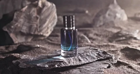 Intense blue perfume in environment rocks and volcanic sand. Stock-Footage 336493326