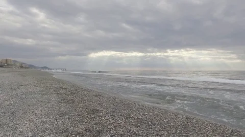 Intense blue waves of the Mediterranean Sea on the coast near the town of Mahmut Stock Footage 72457162