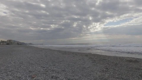Intense blue waves of the Mediterranean Sea on the coast near the town of Mahmut Stock Footage 72457246
