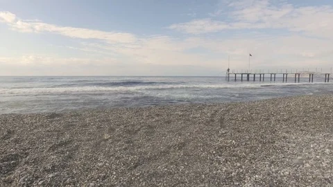 Intense blue waves of the Mediterranean Sea on the coast near the town of Mahmut Stock Footage 72457271