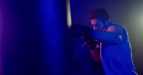 Intense Boxing Training in Dark Room Stock Footage 276489543