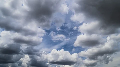 Intense cloud formation with blue skies turning dark and stormy 스톡 동영상 124877410