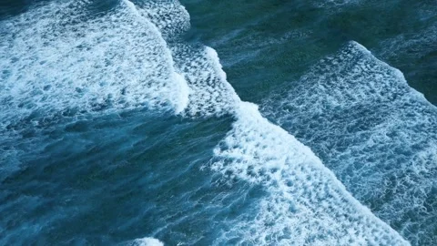 Intense dark waves with white foam, aerial view of breaking surf, barrier reef Stock Footage 274371846