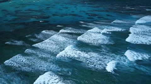 Intense dark waves with white foam, aerial view of breaking surf, barrier reef Stock Footage 274371850