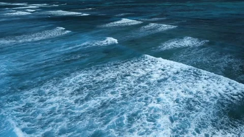 Intense dark waves with white foam, aerial view of breaking surf, barrier reef Video stock 274371857