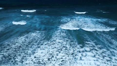 Intense dark waves with white foam, aerial view of breaking surf, barrier reef Stock Footage 274371868