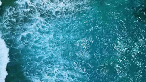 Intense dark waves with white foam, aerial view of breaking surf, barrier reef Stock Footage 274371881