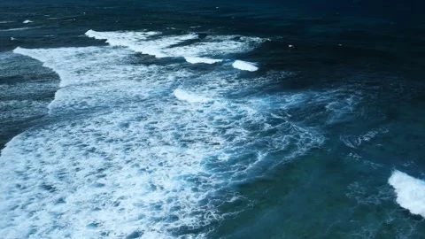 Intense dark waves with white foam, aerial view of breaking surf, barrier reef Stock-Footage 274371888