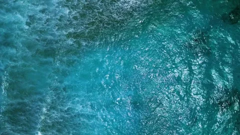 Intense dark waves with white foam, aerial view of breaking surf, barrier reef Stock Footage 274371899