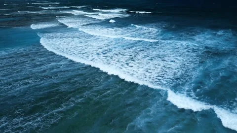 Intense dark waves with white foam, aerial view of breaking surf, barrier reef Stock Footage 274371934