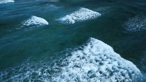 Intense dark waves with white foam, aerial view of breaking surf, barrier reef Stock Footage 274372125