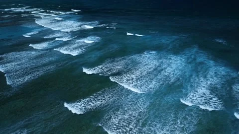 Intense dark waves with white foam, aerial view of breaking surf, barrier reef Stock Footage 274372137