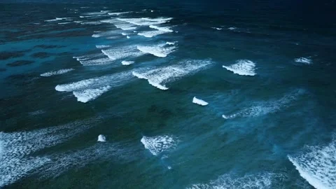 Intense dark waves with white foam, aerial view of breaking surf, barrier reef Stock Footage 274372322