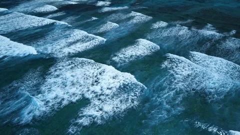 Intense dark waves with white foam, aerial view of breaking surf, barrier reef Stock-Footage 274372402
