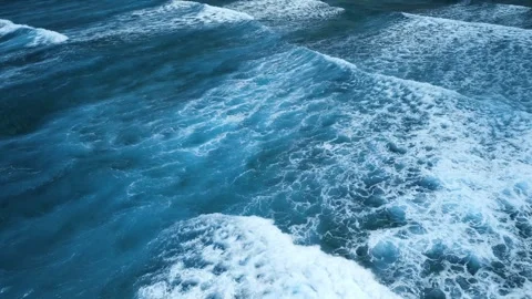 Intense dark waves with white foam, aerial view of breaking surf, barrier reef Stock Footage 274372459