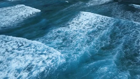 Intense dark waves with white foam, aerial view of breaking surf, barrier reef Stock Footage 274372536
