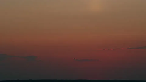 Intense dramatic panoramic sunset. Abstract different shades clouds at sunset Stock Footage 219279632