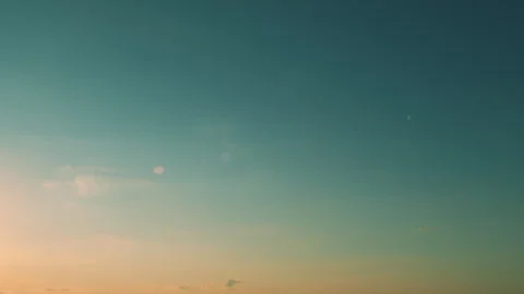 Intense dramatic panoramic sunset. Abstract different shades clouds at sunset Stock Footage 263032549