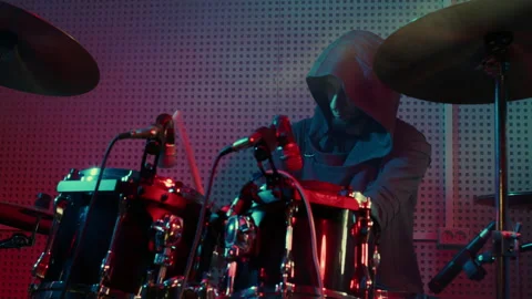 Intense Drumming in a Neon-Lit Studio Video stock 312345897