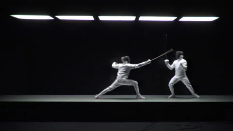 Intense Duel Between Two Professional Male Fencers in Full Gear on Fencing Strip Stock Footage 218476926