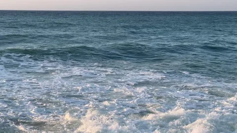Intense, dynamic storm waves against the blue sky Stock Footage 277799383